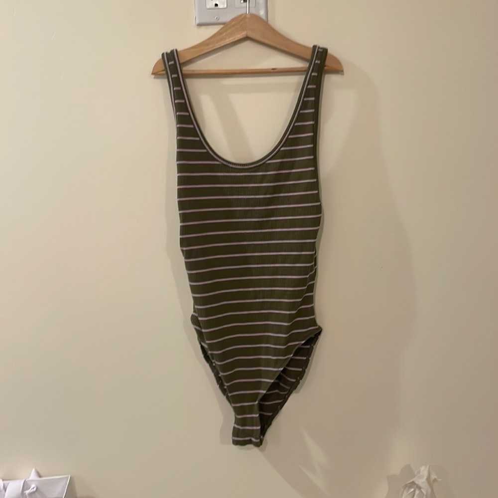 Out from under. Medium. Green and pink.